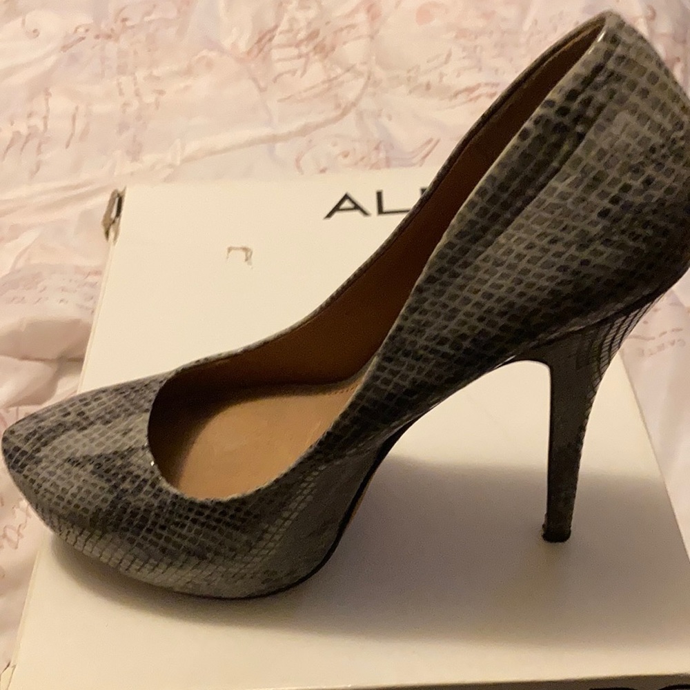 Aldo snake print high heels used good condition.